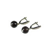 Exclusive earrings with garnet facets