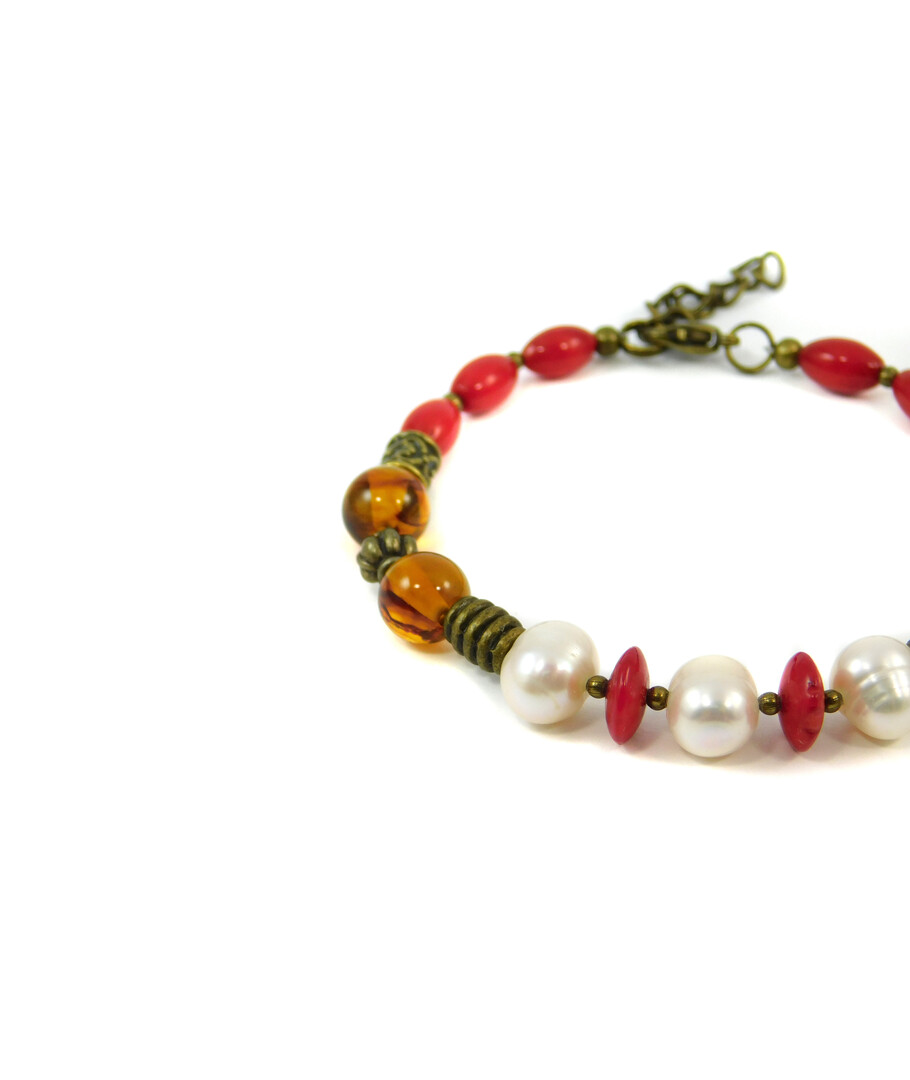 Exclusive bracelet "Remark" Pearls, amber, coral rice, rondel