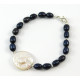 Exclusive bracelet "Effectny" Baroque pearls, black rice, silver