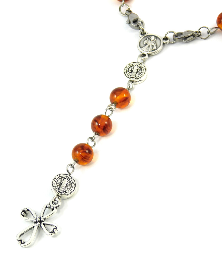 Rosary on hand, Amber