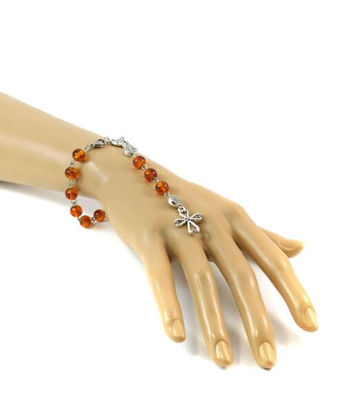 Rosary on hand, Amber